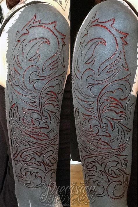 scarification over black tattoo|how to do scarification at home.